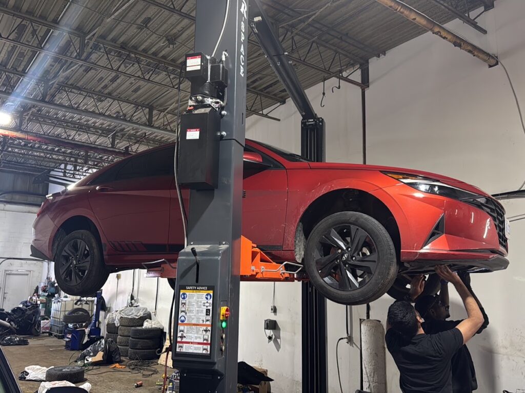 Shah Motors technician working on a vehicle in the Mississauga repair workshop